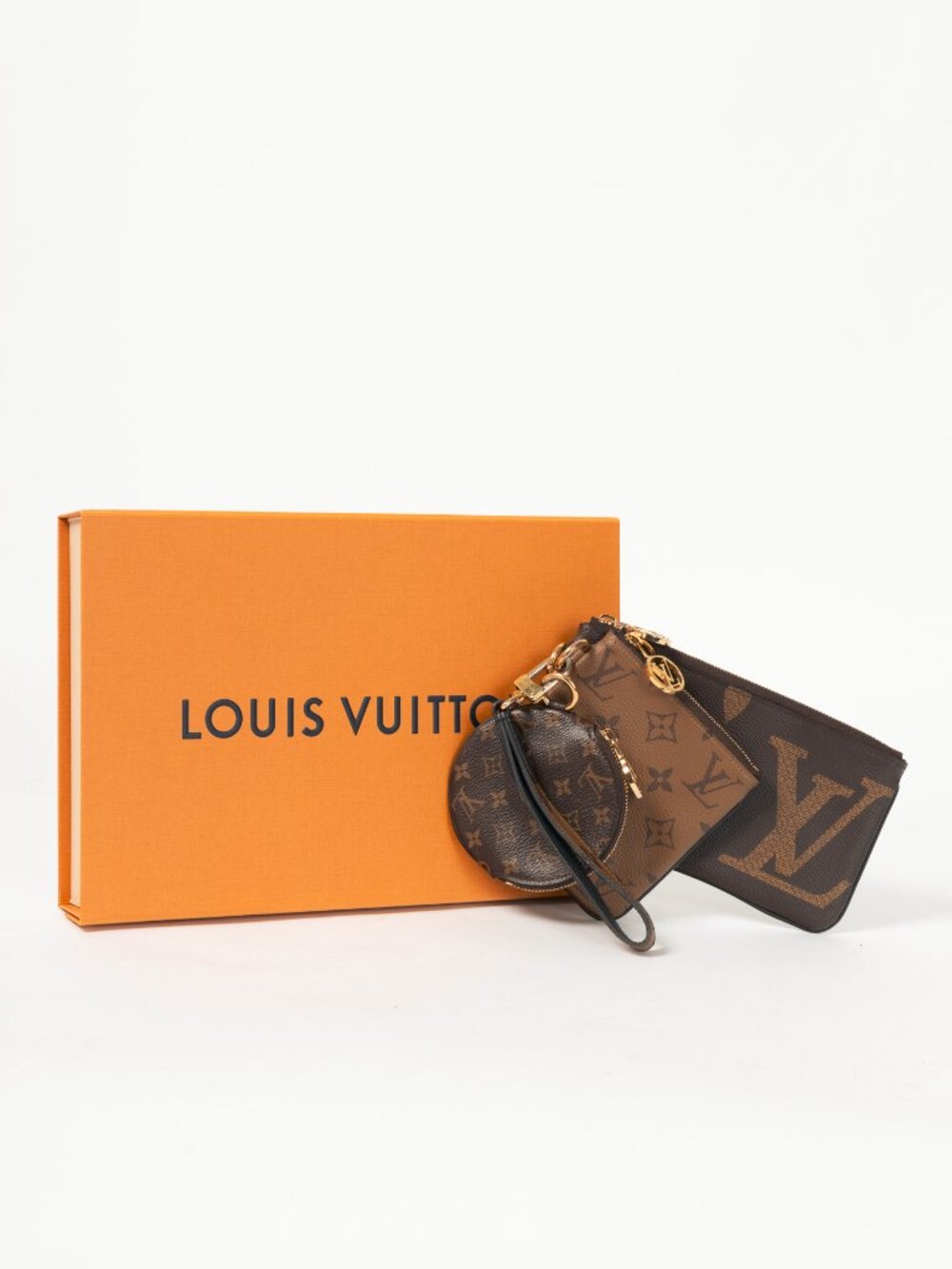 Louis Vuitton Monogram & Monogram Reverse Canvas Trio Pouch - Picture 14 of 14